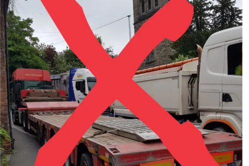 HGVs on Buxton Road with cross