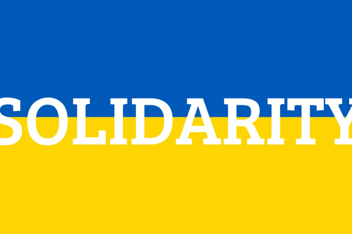 Solidarity on blue yellow background